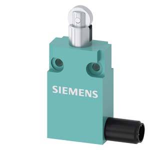 Un interrupteur Siemens vert avec un levier noir sur le côté et un bouton-poussoir rond au-dessus.