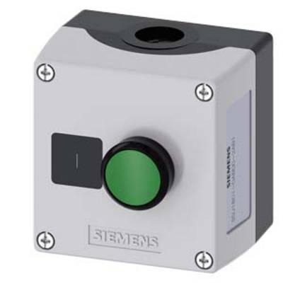 Un boîtier carré Siemens avec un bouton vert et une surface grise. Semble probablement servir d'interrupteur de commande.