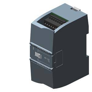 Un module électronique gris avec plusieurs connexions en haut, probablement un dispositif de commande industriel ou un composant de commutation.