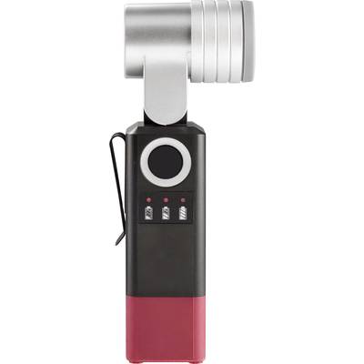 Un microphone compact et portable avec une tête argentée et un socle rouge, adapté aux enregistrements audio lors de déplacements.
