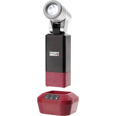 Lampe LED portable au design rouge et noir, placée sur un socle de chargement. Idéale pour les artisans et les activités de plein air.