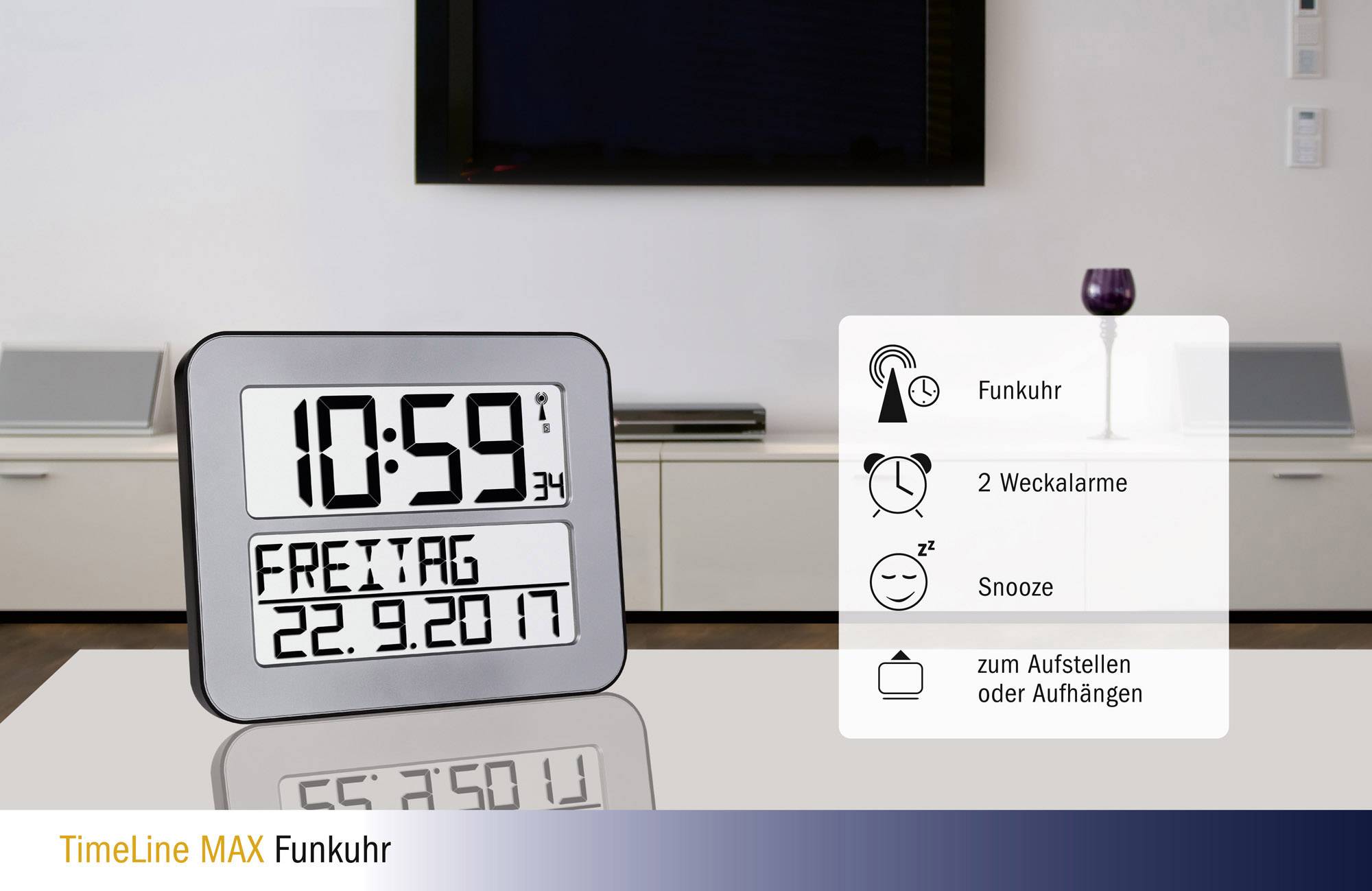 Horloge numérique radio-pilotée avec grand affichage. Affiche l'heure 10:59, date vendredi, 22.09.2017. Fonctions : horloge radio-pilotée, 2 réveils, fonction répétition d'alarme.