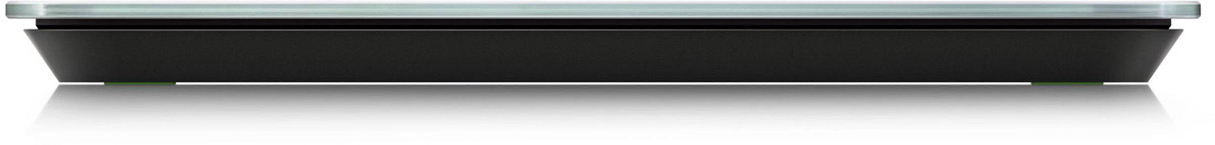 Un scanner plat, moderne, avec un couvercle en verre et un boîtier sombre.