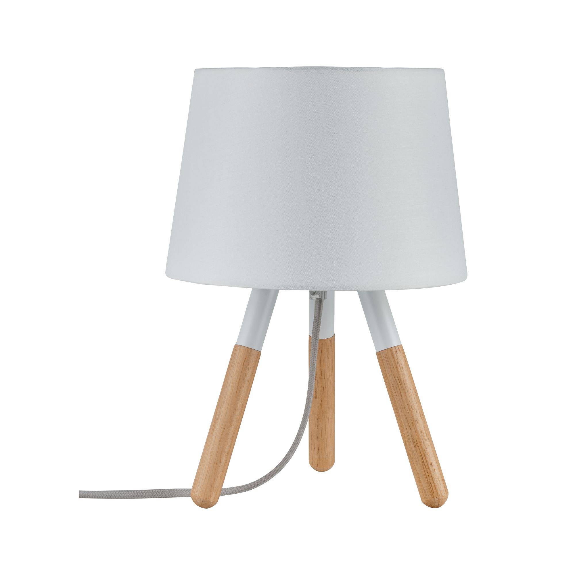 Lampe de table blanche avec abat-jour rond et trois pieds en bois, design moderne.