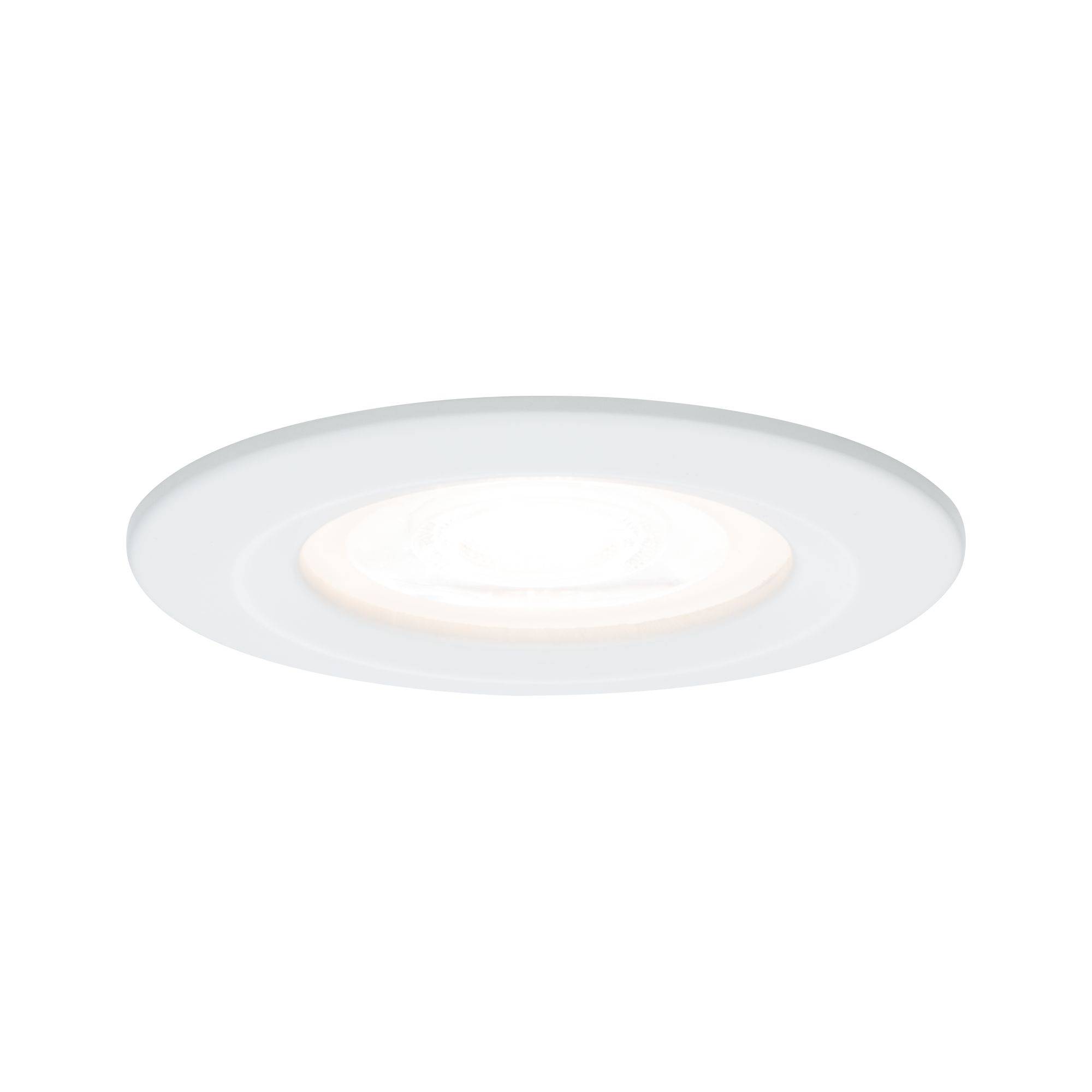 Un downlight LED rond et blanc de style moderne, encastré dans un plafond plat et diffusant une lumière uniforme.