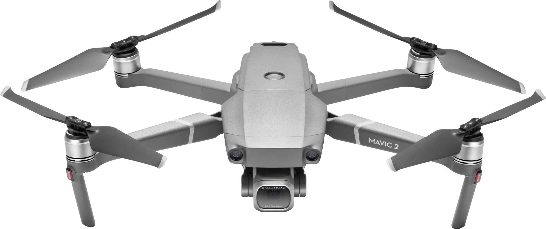 Un drone gris de la marque Mavic 2 plane avec ses rotors déployés dans les airs, prêt à voler.