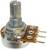 Un potentiomètre circulaire en métal avec un axe rotatif et trois bornes de soudure sur une petite carte de circuit imprimé.