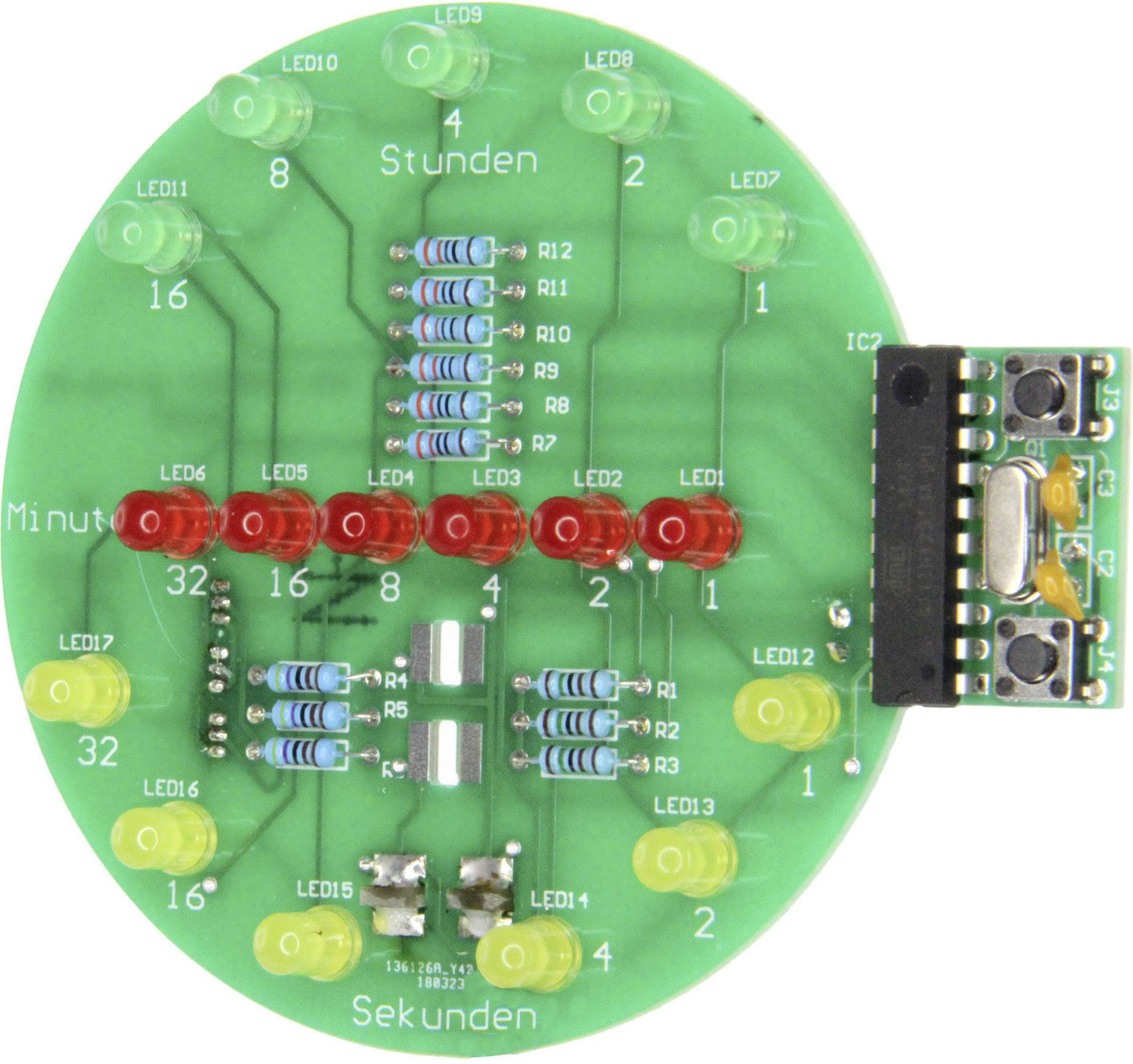 Une carte verte d'une horloge à LED avec des lampes d'affichage pour les heures, les minutes et les secondes.