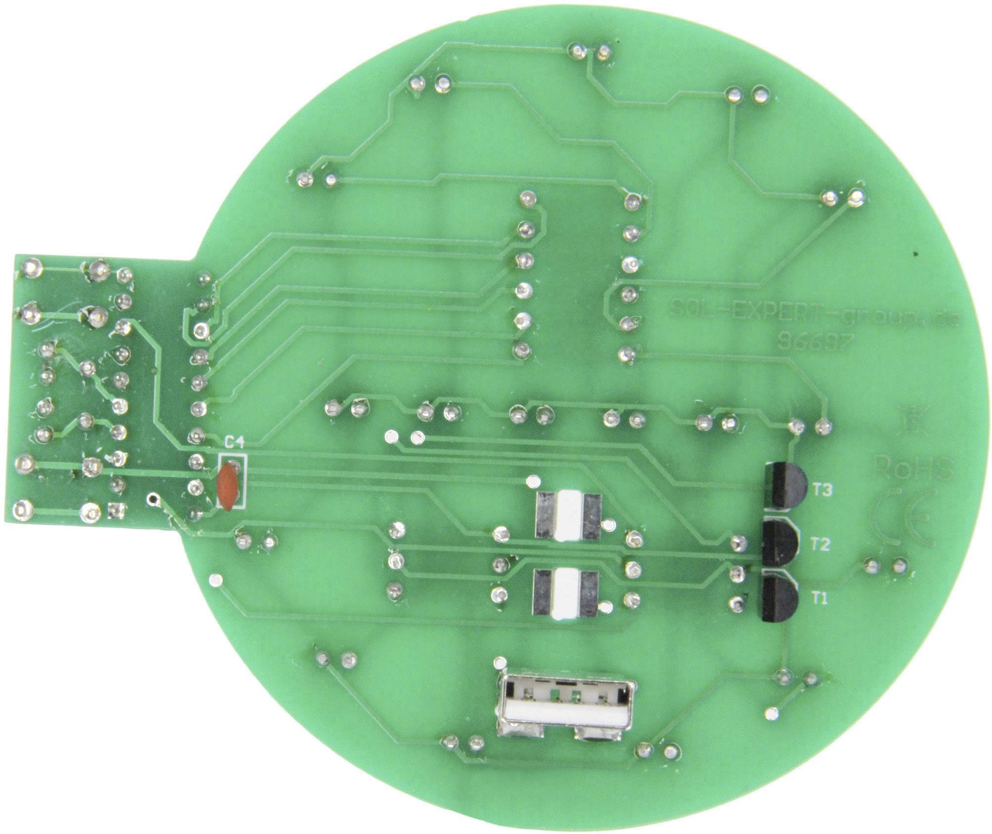 Une carte de circuit imprimé verte et ronde, avec des circuits électroniques et des composants électroniques visibles, et au dos des connexions soudées.