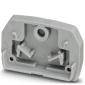 Pièce en plastique grise de forme rectangulaire avec différentes découpes et points de fixation, probablement un élément de raccordement.