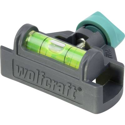 Niveau à bulle avec bulle verte dans un boîtier gris de 'wolfcraft', utilisé pour mesurer avec précision l'horizontalité.