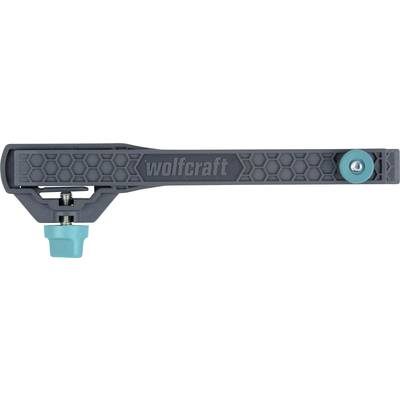 Pied à coulisse gris avec éléments de rotation turquoise et le nom de marque 'wolfcraft'.