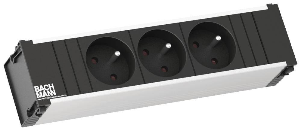 Bloc multiprise triple dans un boîtier rectangulaire, adapté aux fiches européennes, marque 'Bachmann', coloris noir et argent.