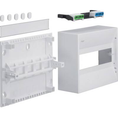 Kit électronique avec boîtier en plastique, couvercle avant, plaque de montage et connecteurs. Les composants sont conçus de manière modulaire.