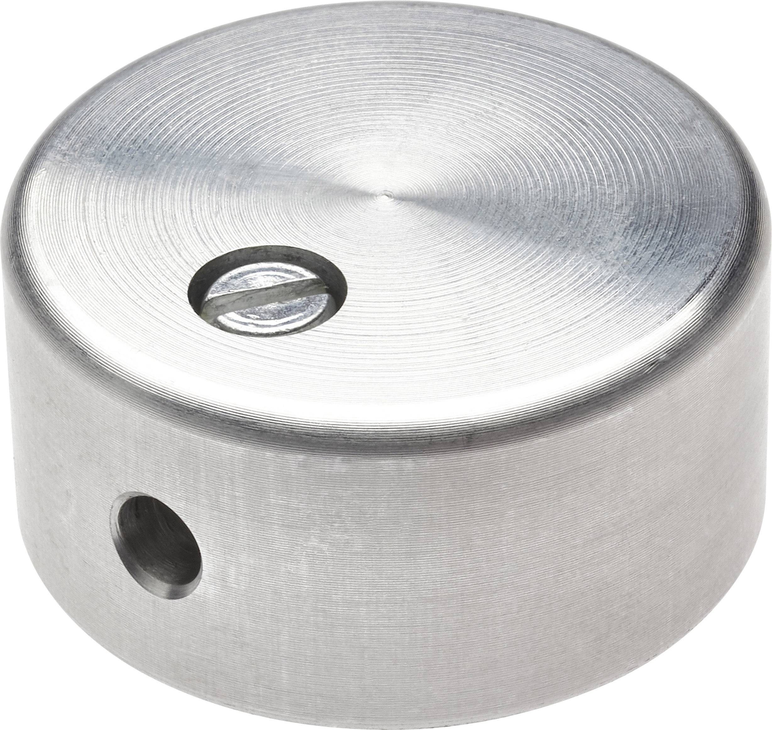 Un embout métallique argenté, rond, avec une vis encastrée et un trou sur le côté, probablement un élément d'un kit de construction de meuble.