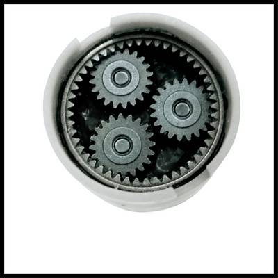 Quatre roues dentées s'emboîtant les unes dans les autres à l'intérieur d'un boîtier circulaire.