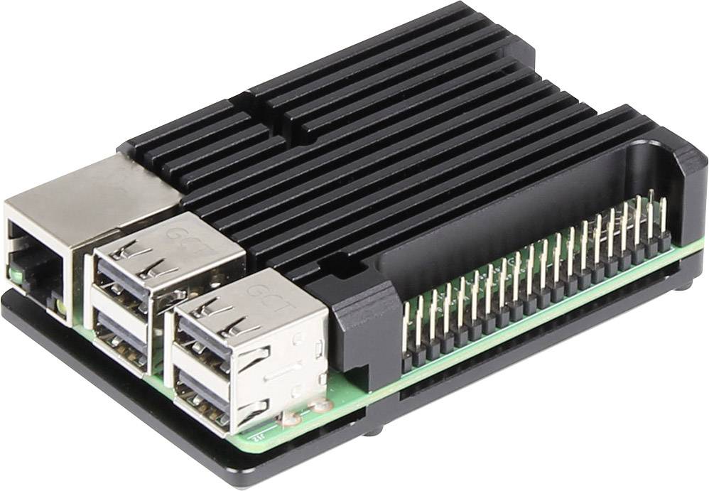 Un ordinateur monocarte doté de plusieurs ports USB, d'un port Ethernet et d'une rangée de broches. Un dissipateur thermique sombre est monté dessus.