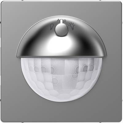 Un détecteur de mouvement argenté avec un symbole de mode LED et automatique sur un fond gris.