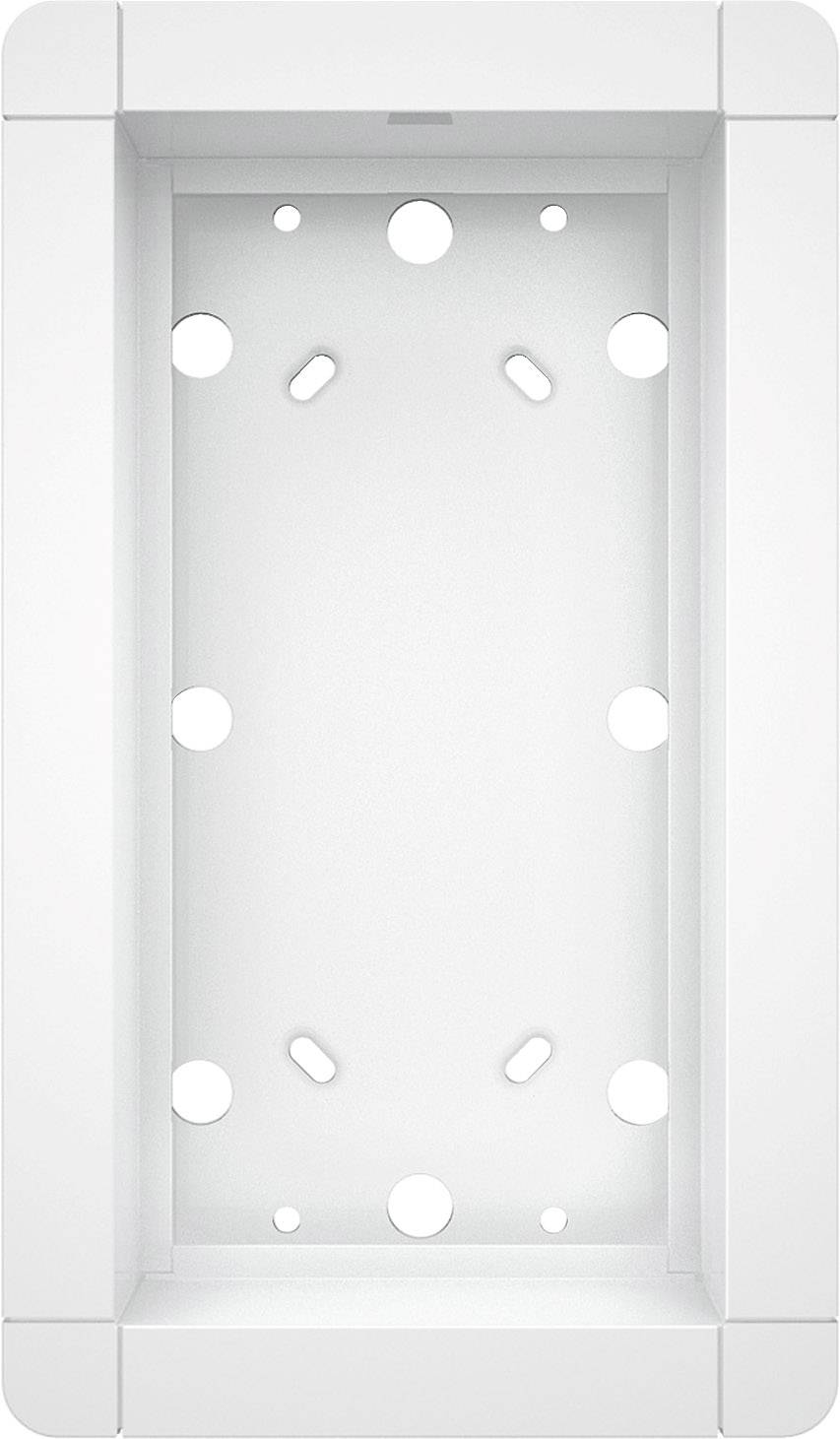 Une découpe rectangulaire blanche dans un mur, comportant plusieurs trous ronds pour la fixation de composants électriques.