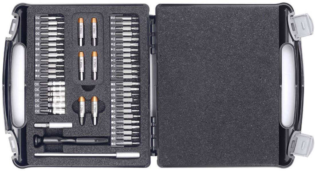 Une trousse à outils ouverte contenant différents embouts de tournevis, une poignée et des rallonges, rangés dans de la mousse de protection.