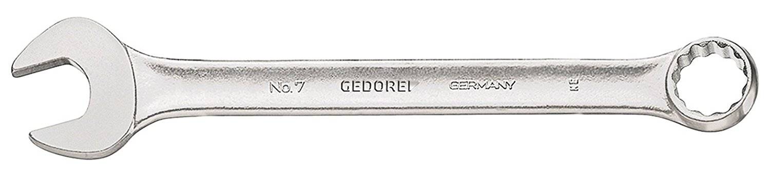 Une clé à fourche en argent avec un côté ouvert et un côté en forme d'anneau, sur laquelle sont gravés 'GEDORE' et 'GERMANY'.