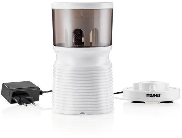 Taille-crayon électrique avec adaptateur secteur et bloc-lames intégré. Boîtier blanc avec réservoir semi-transparent pour les copeaux.