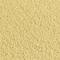 Surface beige de sable avec une structure fine et uniforme, évoquant un paysage de dunes.
