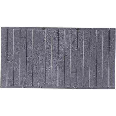 Surface grise avec des motifs rectangulaires structurés. Les dalles sont disposées de manière uniforme et forment des lignes parallèles.