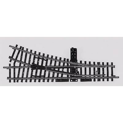 Aiguillage de train miniature en métal, présentant trois voies : deux droites et un rail de déviation. Essentiel pour la conduite des trains.