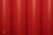 Surface rouge mate avec un léger brillant et une texture structurée.