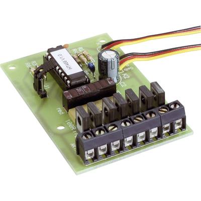 Une carte électronique verte comportant plusieurs composants électroniques tels que des résistances, un condensateur et un circuit intégré.