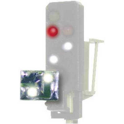 Un signal de circulation gris avec un voyant rouge lumineux en haut. En dessous, plusieurs lumières plus claires et sur le côté, un petit ensemble lumineux.