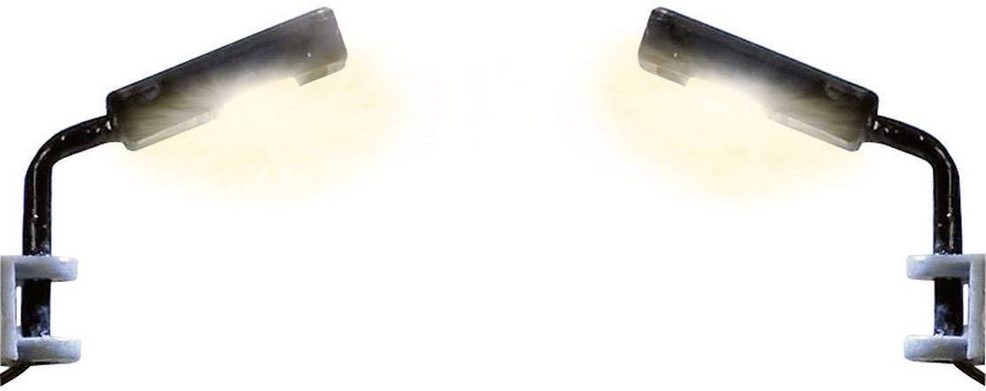 Deux lampes de lecture noires avec lumière blanche, montées sur des bras incurvés symétriques, fixés à des supports blancs.