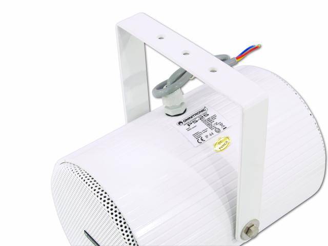 Enceinte cylindrique blanche avec support et câbles, présentant une étiquette avec des détails techniques et des certifications.