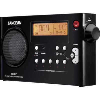 Radio portable noir avec touches de sélection de station et un écran affichant '100.7 FM' et '8:00'. Haut-parleur à gauche, molette de volume à droite.