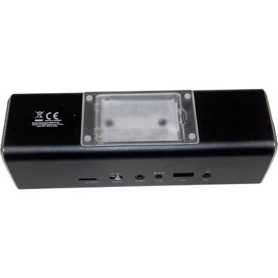 Appareil électronique noir vu de dos avec plusieurs ports : logement pour carte SD, USB, audio et port de charge. Compartiment transparent en haut.