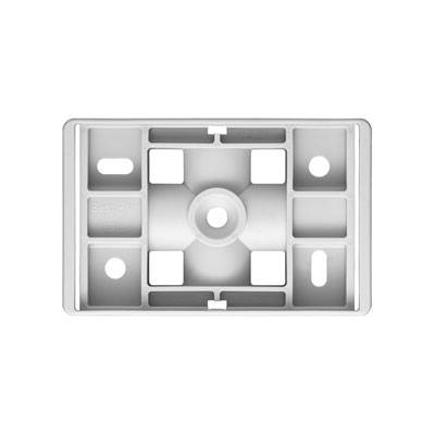 Support rectangulaire blanc en plastique avec plusieurs ouvertures et un cercle central, probablement destiné à des fins de montage.