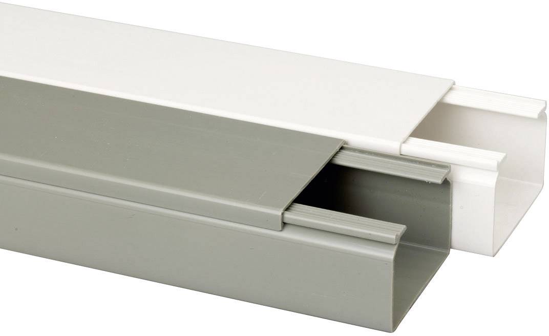 Des gaines techniques en plastique, l'une en blanc et l'autre en gris, disposées côte à côte, montrent leurs ouvertures destinées au passage des câbles.