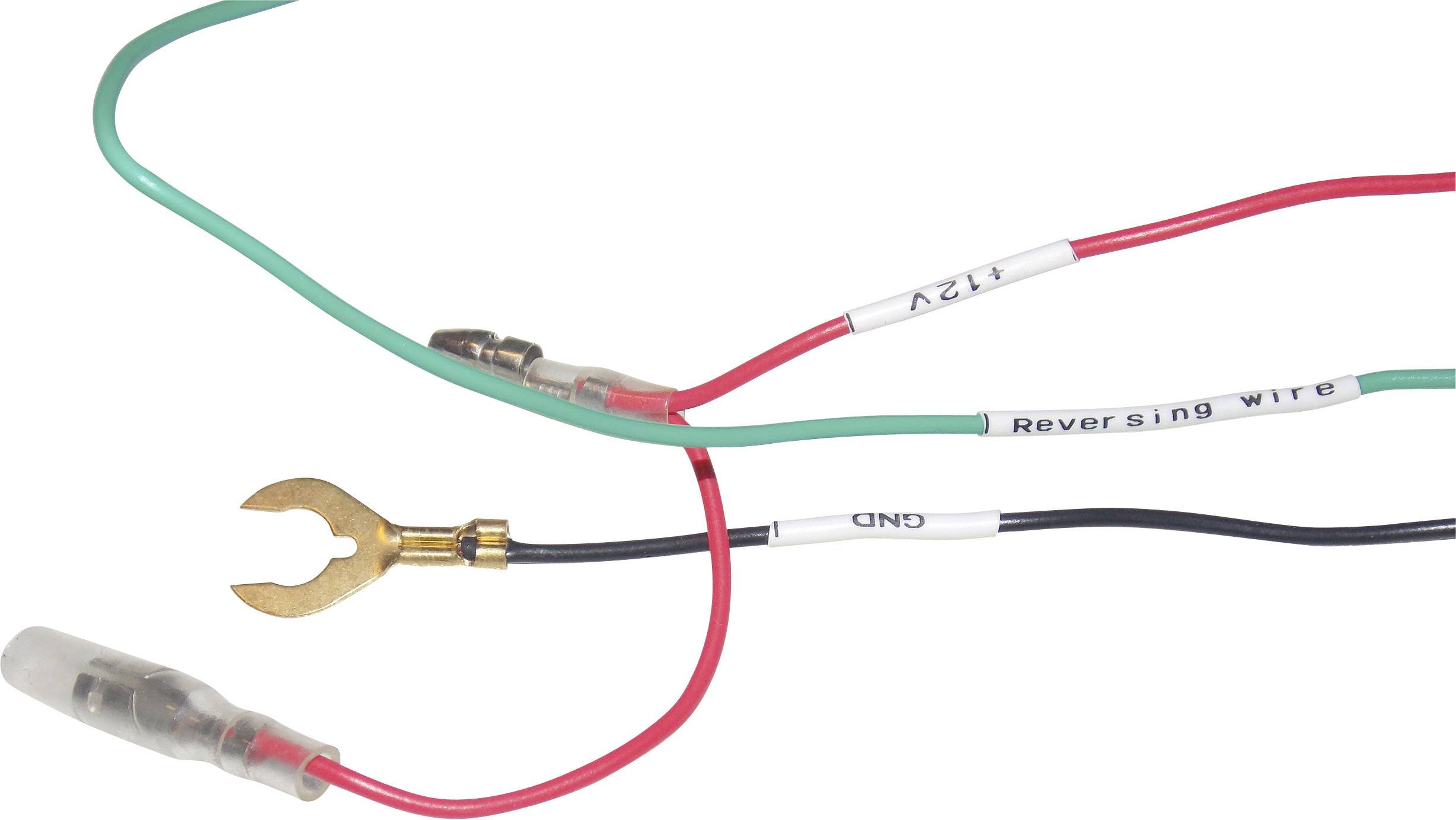 Fils électriques multicolores étiquetés 'Reversing wire', 'GND' et '12V', maintenus par un support métallique.