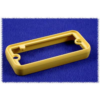 Pièce rectangulaire jaune en plastique avec deux trous, posée sur un fond bleu.