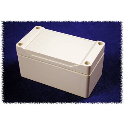 Boîte en plastique blanche rectangulaire aux coins arrondis, sur un fond sombre. La boîte présente quatre trous de vis aux angles.