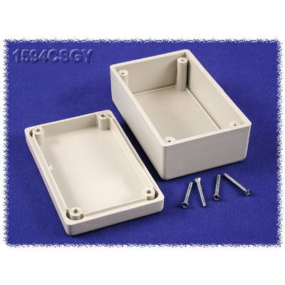 Boîtier rectangulaire en plastique avec couvercle retiré, quatre vis à côté. Utilisé pour le boîtier de composants électroniques.