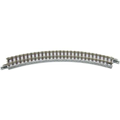 Morceau courbe d'un rail de chemin de fer miniature avec deux rails parallèles et des traverses sur un lit de ballast gris.