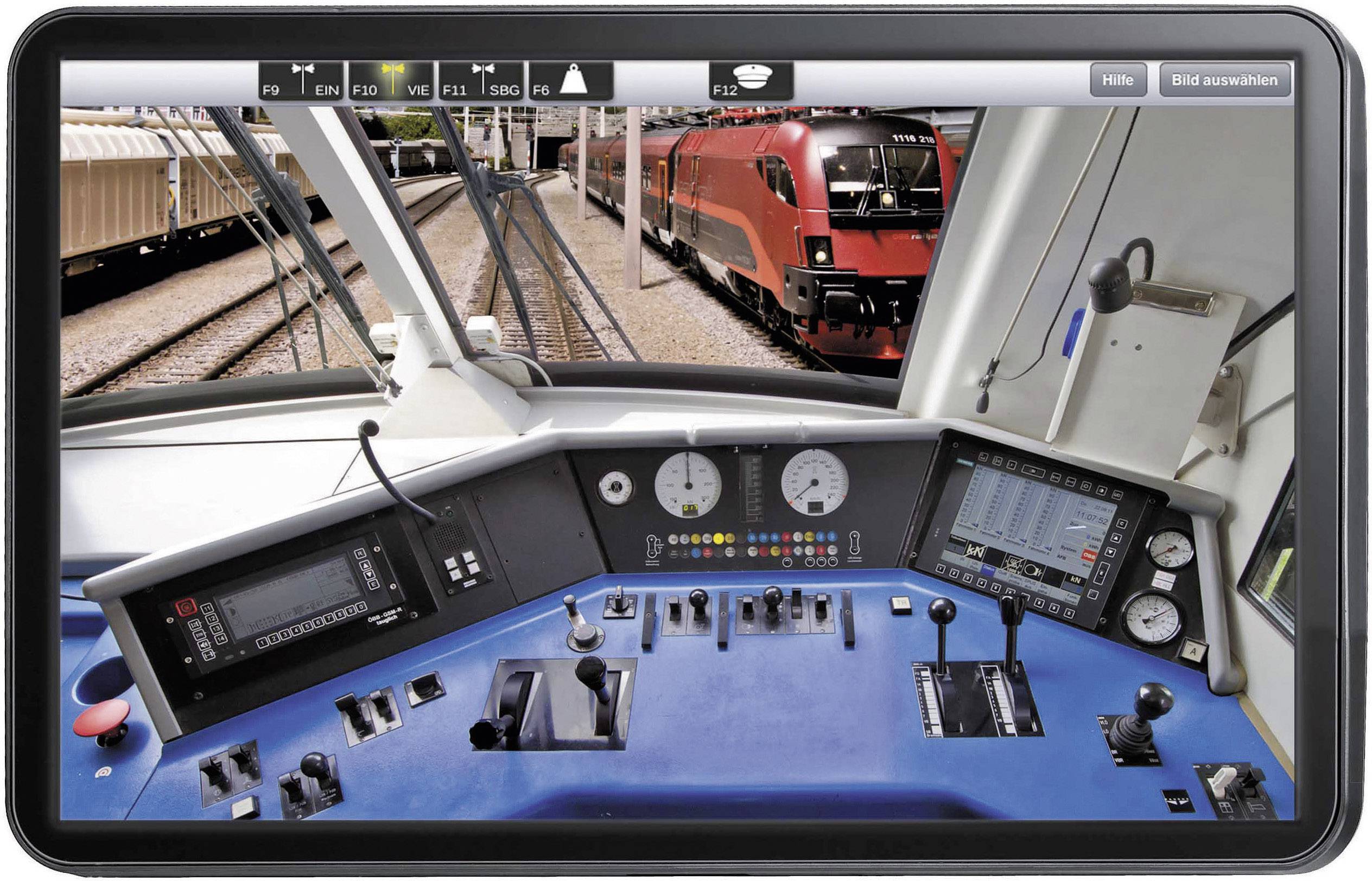Vue depuis le poste de conduite d'un train sur des voies avec plusieurs trains. Tableau de bord avec instruments et écrans au premier plan.