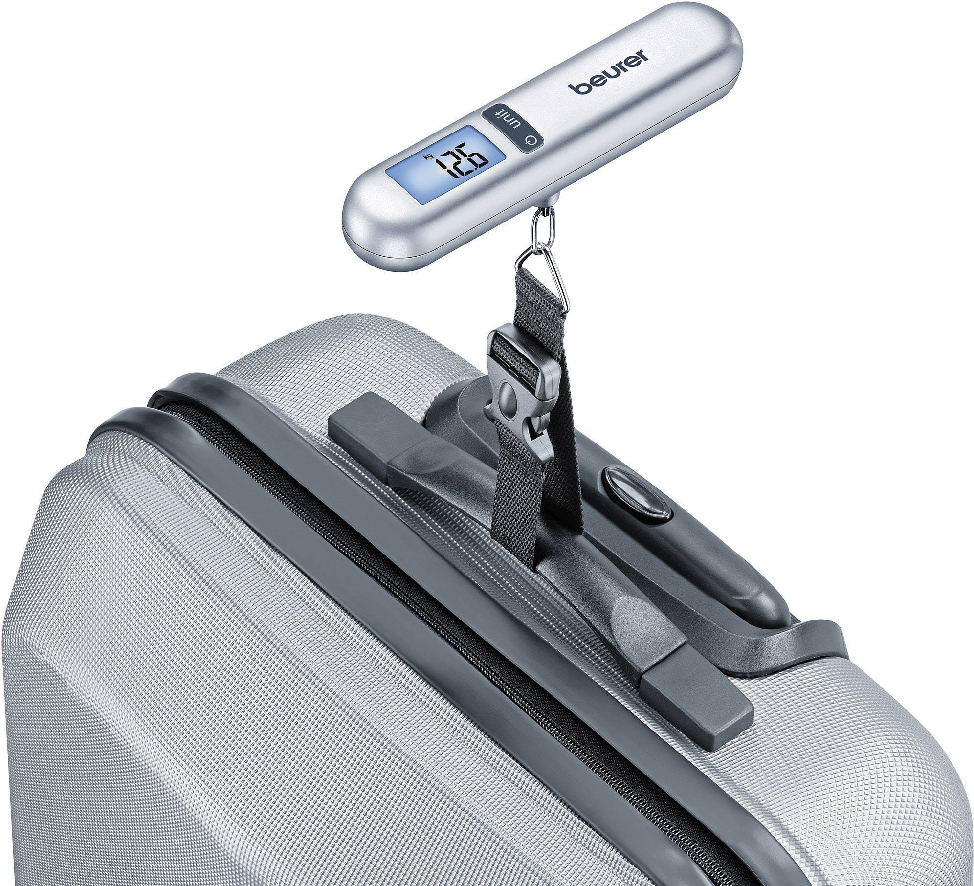 Valise sur une balance numérique de capacité, affichant 15,0 kg.