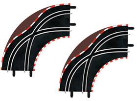 Deux courbes de rails noires avec des voies blanches et des marquages de bordure rouge et blanc pour un circuit de course automobile.