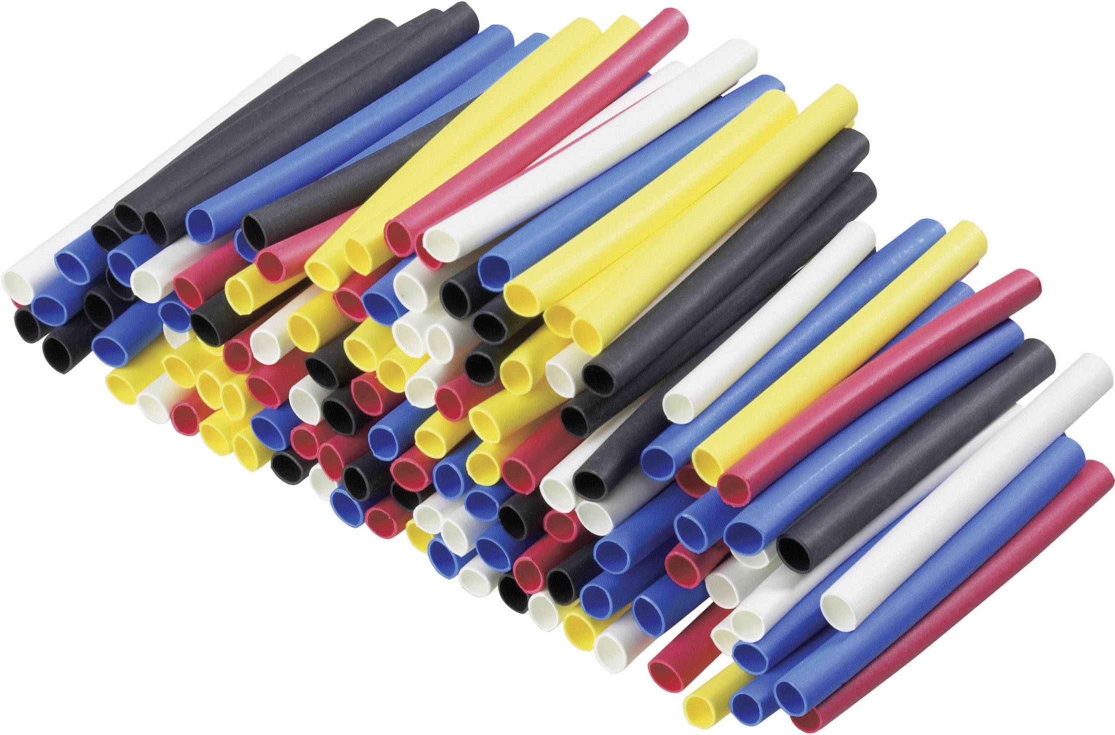 Gaines thermorétractables colorées dans différentes couleurs comme le rouge, le bleu, le jaune, le blanc et le noir, empilées les unes sur les autres.