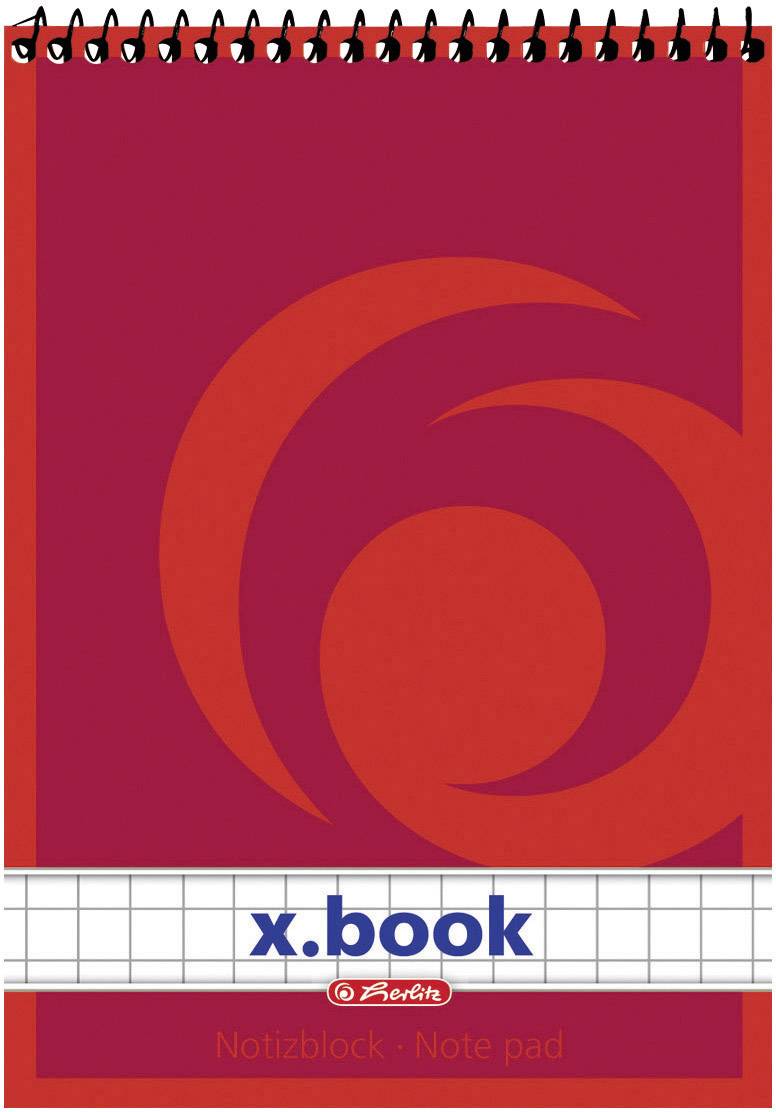 Carnet à spirales avec une couverture rouge, portant l'inscription 'x.book' et un motif graphique. Du papier quadrillé est visible en dessous.