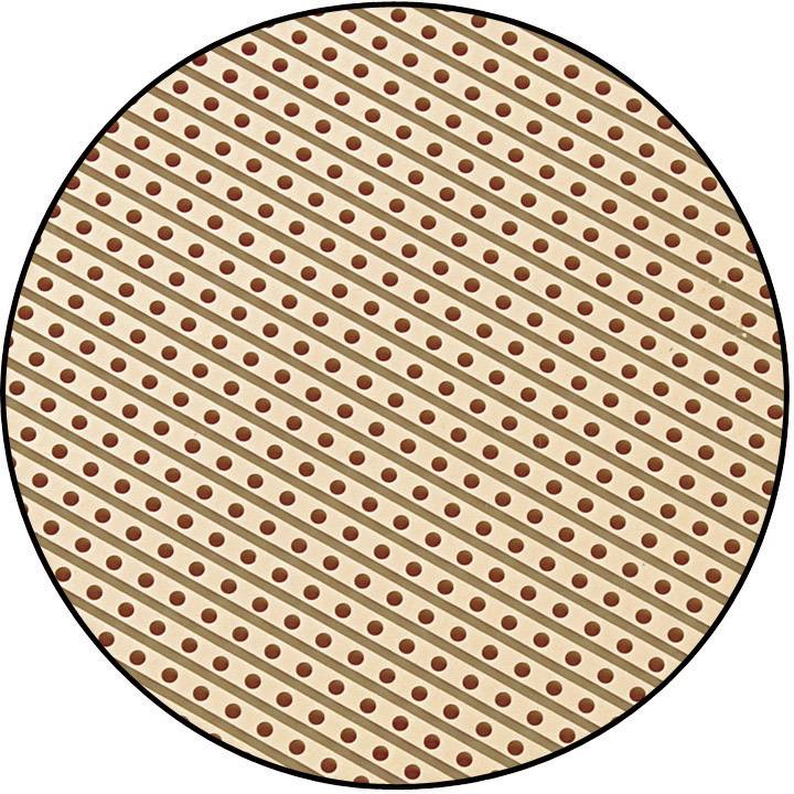 Pansement rond avec des rayures diagonales et des petits trous régulièrement répartis, probablement destinés à améliorer la ventilation.