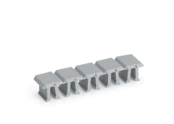 Un connecteur en plastique gris avec cinq clips uniformément espacés en ligne, utilisé pour attacher des câbles ou des conduites.